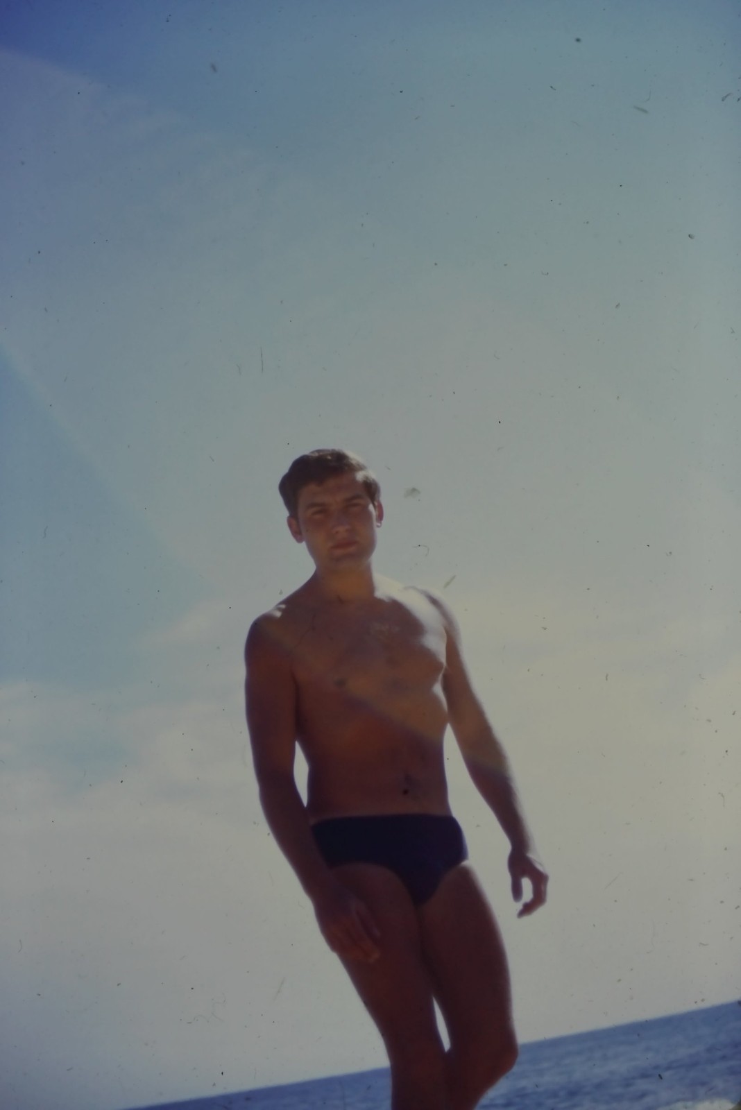 c1960's Kodachrome 35mm Slide Young Man Swim Trunks Beach Ocean Portrait Water
