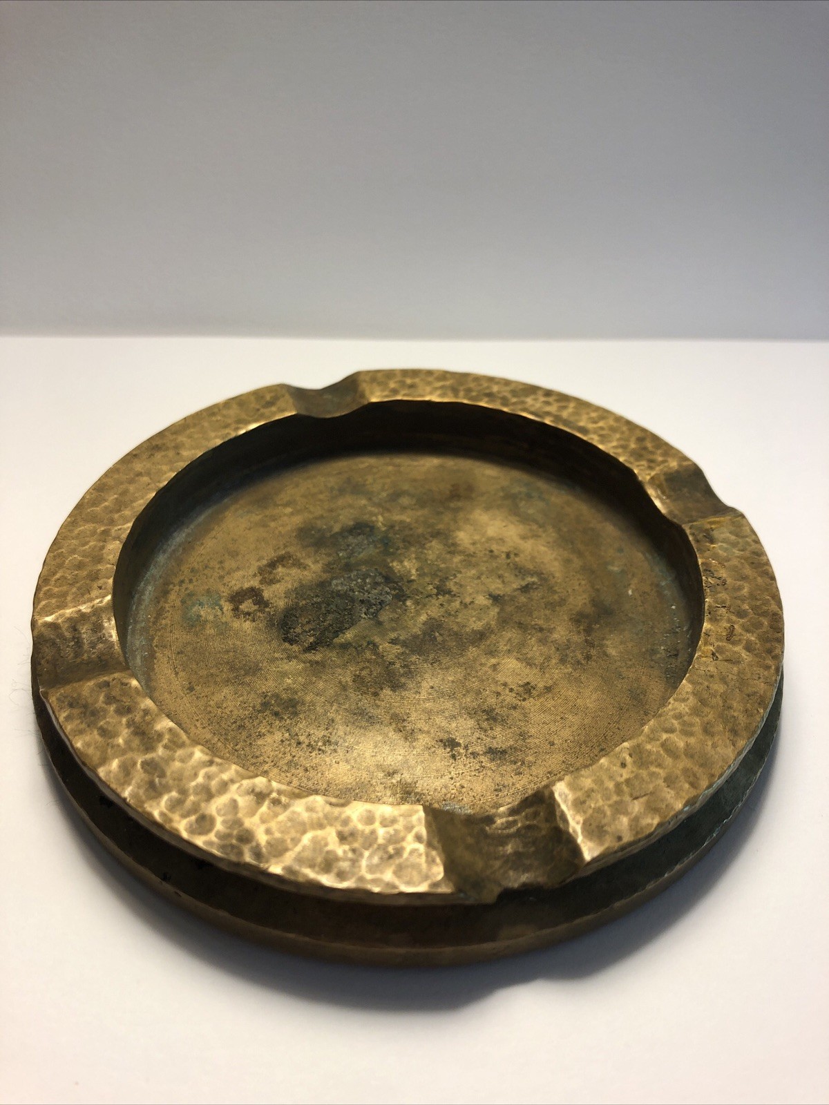 vintage round brass ashtray used worn green felt bottom hammered found grandmas