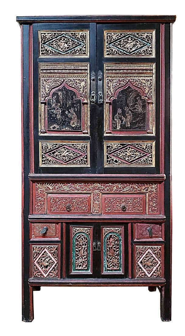 A Two Door Carved Wooden Cabinet