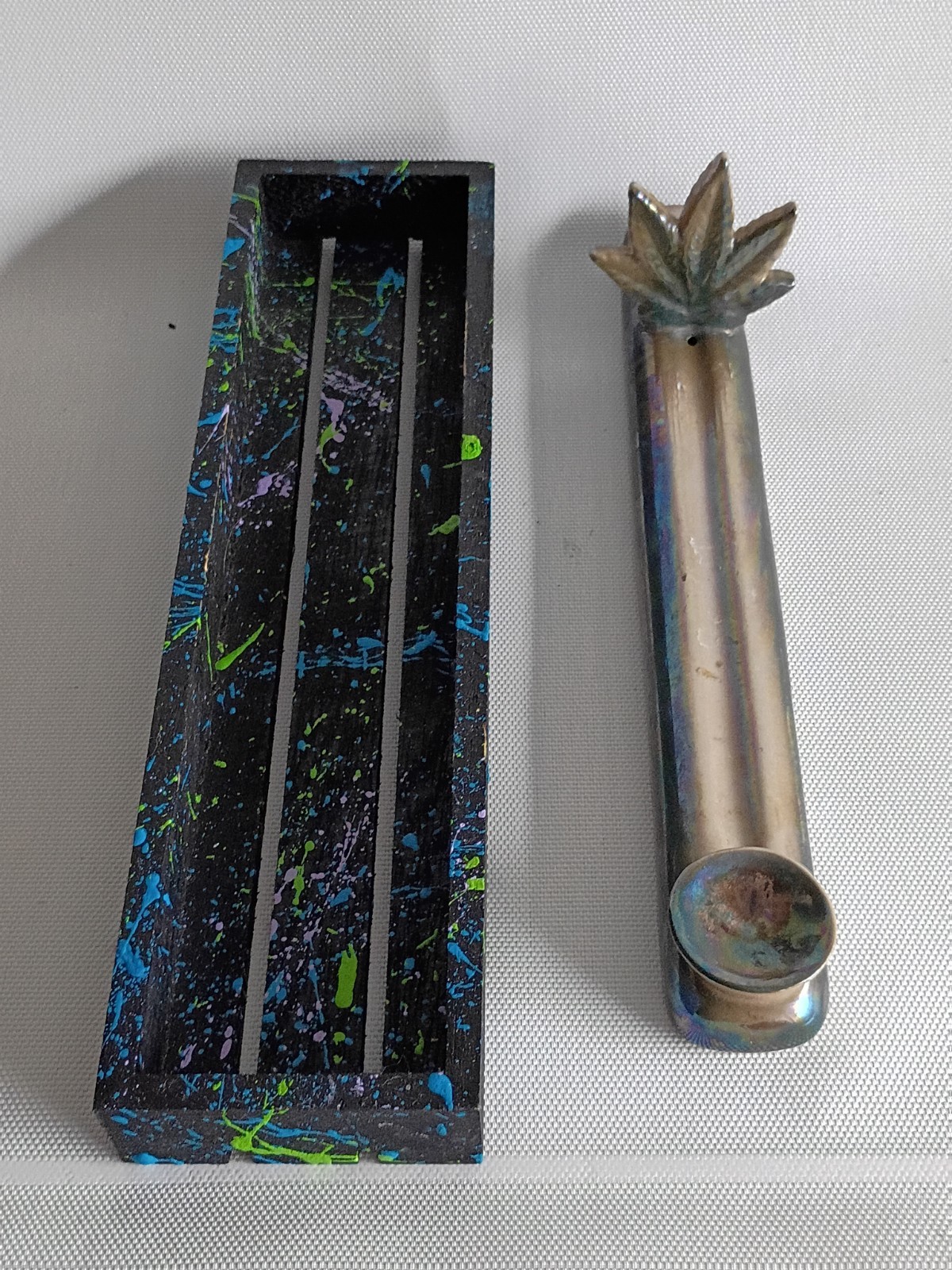  iridescent metallic or glazed ceramic incense burner  leaf-shaped at one end