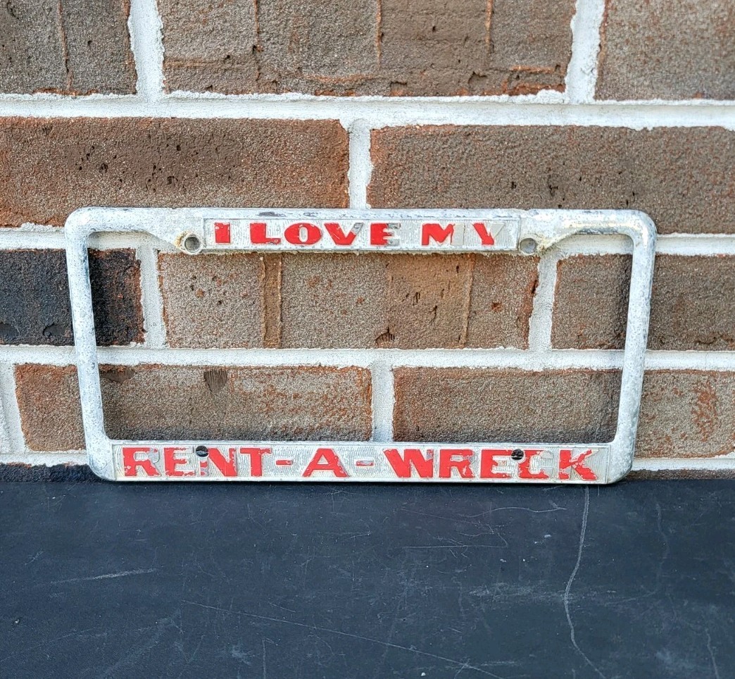 Vintage I Love My Rent A Wreck Metal License Plate Frame Rare 60s 70s