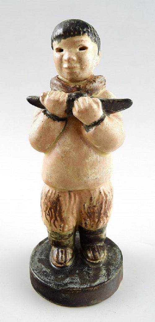 Rare Arne Ingdam, Denmark 60s, Eskimo boy with kayak, ceramics.