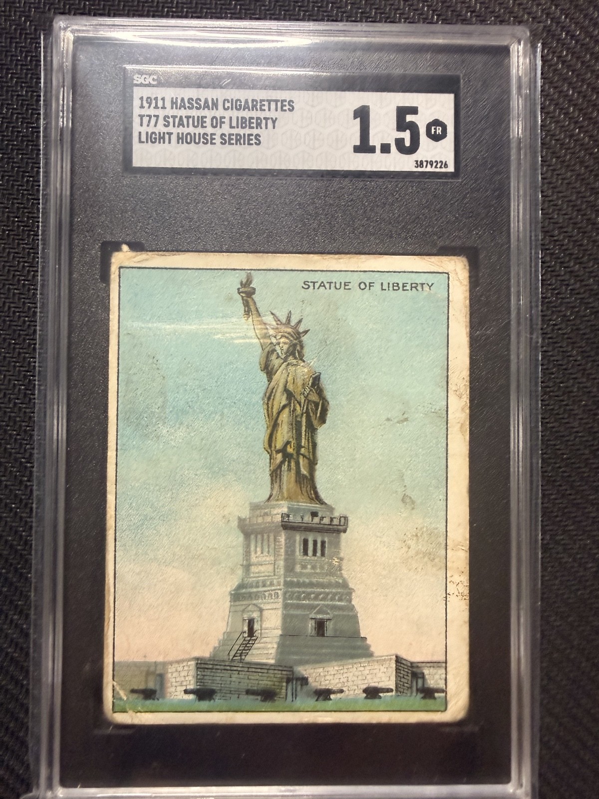 1911 T77 Hassan Light House Series Statue of Liberty SGC 1.5