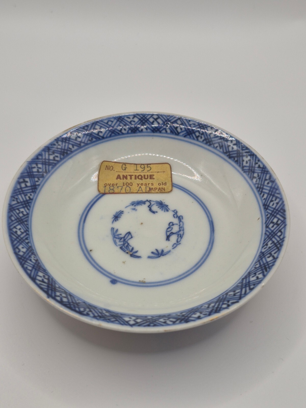 Blue and White Chinese Style Bowl with Label