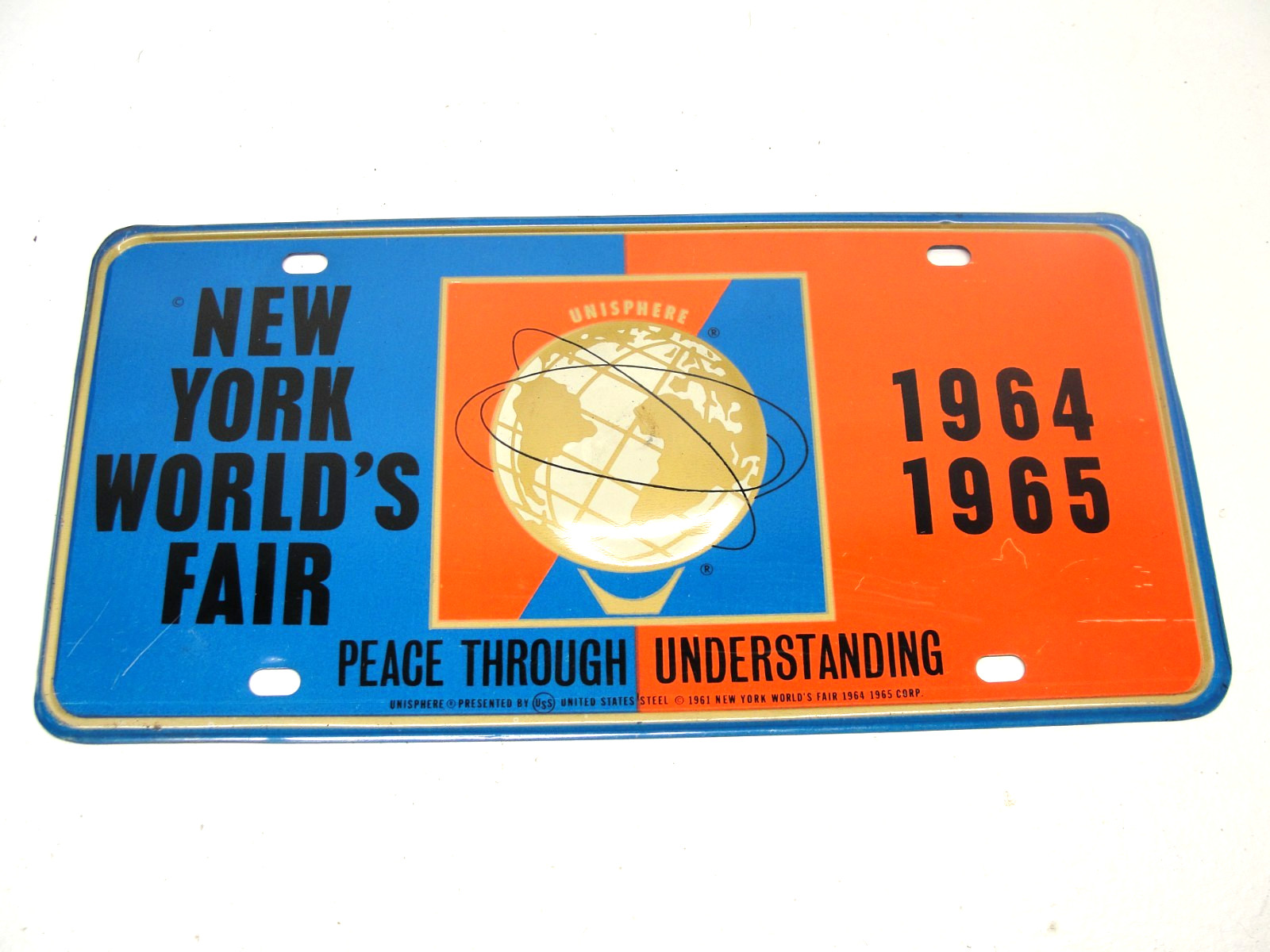VINTAGE 1964 1965 NEW YORK WORLD\'S FAIR BOOSTER LICENSE PLATE