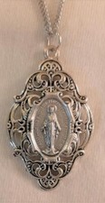 Lacy Festooned Filigree Scroll Rimmed Immaculate Mary Medal Silvertone Necklace picture