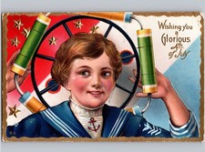 c1915 Glorious 4th Of July Cute Sailor Boy Wheel Of Fireworks Embossed Patriotic picture