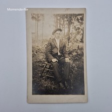Antique RPPC Young Man Flat Cap Seated Outdoors NOKO Real Photo Postcard 1910s picture
