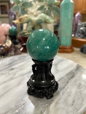 Amazonite high grade sphere with black resin stand 2.11” picture