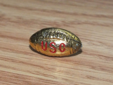 Small Gold Tone Solid Metal Football Shaped Collectible USC Sports Souvenir Pin picture