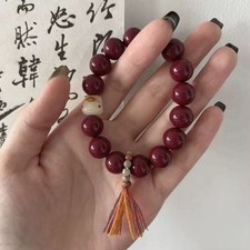 Elegant Red Beads Bracelet with Tassel Accent picture