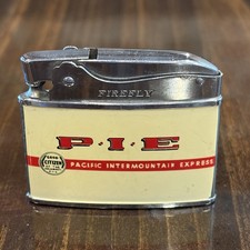 Vintage Pacific Intermountain Express Trucking P.I.E. Firefly Lighter Very Good picture