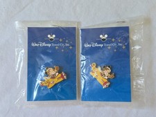 2 Walt Disney Travel Co. Mickey Mouse Yellow Airplane Enamel Pin - New on Card picture