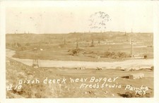 1927 RPPC Dixon Creek Borger Texas Oil Field Derrick Boom Fred's Studio Pampa picture