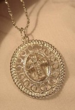 Lovely Swirl Rimmed Silvertone Raised Rhinestone Cross Oval Pendant Necklace picture