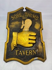 Vintage sore thumb tavern cast metal bar sign  10 inch x 16 inch made in Japan picture