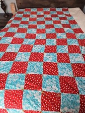 Vintage fifty two by ninety red and blue patchwork knotted quilt picture