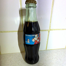Coca-Cola Classic Christmas 1995 8 fl oz Clear Glass Contour Soda Bottle picture