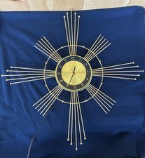Vintage Mid Century Modern Electric Wall Clock Made by Luxe Starburst Gold-tone picture