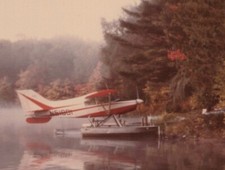 1970s Scenic Lake Cabin Floatplane Misty Morning Reflection picture