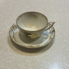 White Porcelain Teacup And Saucer Made In Prussia With Gold Accents picture
