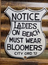 VINTAGE NUDE BEACH PORCELAIN SIGN OLD NOTICE LADIES MUST WEAR BLOOMERS SHIELD  picture