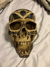 Vintage Adam’s apple tribal skull picture