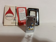 DONALD DUCK 1975 VINTAGE ZIPPO LIGHTER BRADFORD PA. NIB  W/ALL PAPERWORK RARE picture