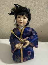 VINTAGE PORCELAIN ASIAN JAPANESE KNEELING GIRL DOLL WITH PILLOW, KIMONO picture