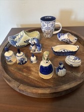 9 Piece Delft Blue Porcelain Set. With 2 extra pieces. ( not sure on extra 2) picture