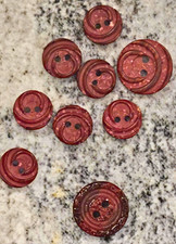 Vintage Celluloid Burgundy Red Marbled Carved Swirl 2-Hole Buttons Lot of 9 picture