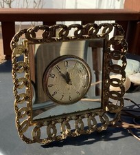 VINTAGE ELECTRIC CLOCK WITH MIRROR - MOVEMENT BY LANSHIRE CO. CHICAGO,IL. picture
