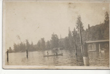 1909 SEATTLE WASHINGTON REAL PHOTO RPPC VIEW OF ID'D LADY IN CANOE - BOAT HOUSE picture