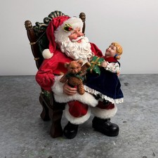 Ashley Cooper Christmas Collectibles￼ Santa with child “And What Would You Like” picture
