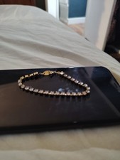 Vintage AVON Goldtone Small RHINESTONE Tennis Bracelet picture