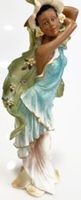 YOUNG AFRICAN AMERICAN WOMEN IN BLUE VINTAGE FIGURINE WITH LARGE LEAVES 12