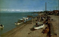 Kotzebue Alaska Arctic Ocean boats Eskimo children mailed 1960s vintage postcard picture