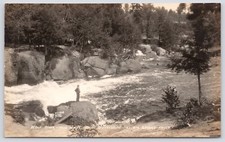 Postcard RPPC Man Stands on Bank, Wolf River, Big Smokey Falls Keshena WI c1920s picture