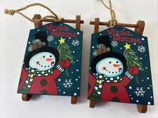 2 Creative Design Limited Wooden Sled 2012 Christmas Ornament 4 1/2” X 3” picture