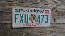 Oklahoma Native America Tribal Drum embossed license plate picked at random picture
