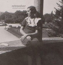 Pensive Young Woman Resting Between Paths And Silence In Timeless Garden Photo picture