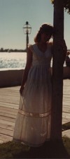 1980s Pretty Woman White Dress Waterfront Portrait Backlit Seaside Glamour picture