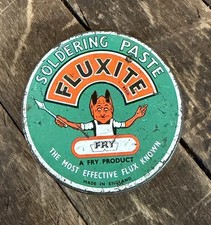 VINTAGE C. 1950 FLUXITE SOLDERING PASTE TIN CAN SIGN DEVIL SATAN EVIL ENGLAND picture
