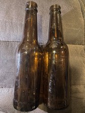Two Anheuser Bottles Seemingly From 1970s Embossed With A Eagle Design picture