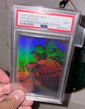 1996 Fleer/Skybox Man Of Steel/Superman Holocel Clear Card, PSA Graded Mint 9 picture
