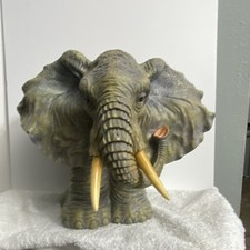 Collectible Gray Elephant Figurine Statue with Yellow Tusks picture