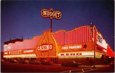 c1960s CARSON CITY, Nevada Postcard THE NUGGET CASINO Street View / Night picture