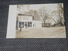 Country Shoe Store Front Dirt Rd Old Car Full Of Family RPPC PhotoPostcard 2970 picture