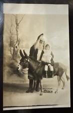 Antique RPPC Real Photograph Postcard Adorable Girl, Santa,Donkey 1915, Odd picture
