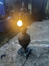 This item is an antique 19th-century French Neo-Greek style lamp, featuring picture